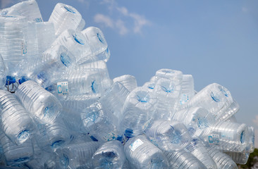 plastic bottle with caps for recycle waste,lot of water bottle waste separation concept selective focus
