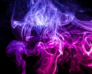Fototapeta premium Colored smoke on black background