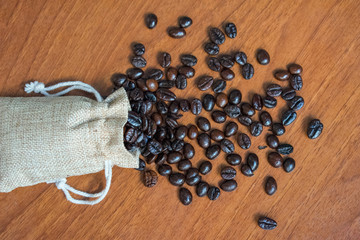 Obraz na płótnie Canvas coffee beans in burlap sack