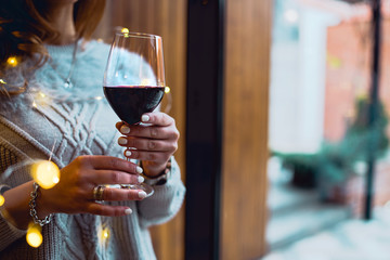 woman with glass of wine