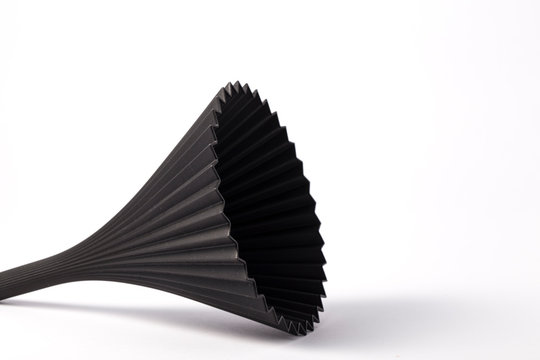 Black plastic funnel on white background
