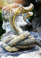 Obraz premium king of nagas statue or large snake on the rock