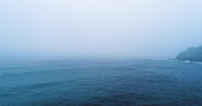 Aerial, dense fog over ocean