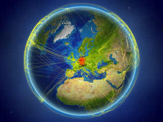 Germany from space on planet Earth with digital network representing international communication, technology and travel.