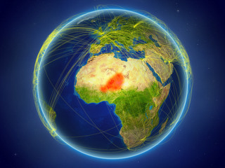 Niger from space on planet Earth with digital network representing international communication, technology and travel.