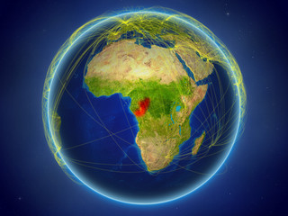Congo from space on planet Earth with digital network representing international communication, technology and travel.