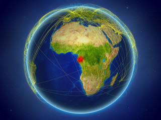 Gabon from space on planet Earth with digital network representing international communication, technology and travel.