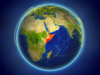 Somalia from space on planet Earth with digital network representing international communication, technology and travel.