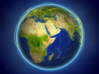 Djibouti from space on planet Earth with digital network representing international communication, technology and travel.