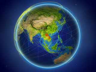 Laos from space on planet Earth with digital network representing international communication, technology and travel.