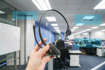 close up woman hold headset for callcenter, telemarketing and business conference in office