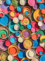 background of a variety of clay colored plates of different sizes.