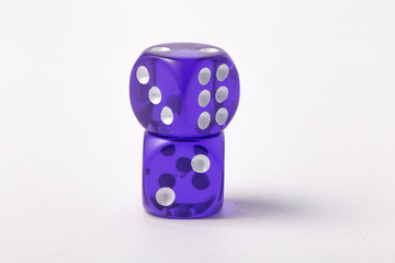 Two violet dice isolated on white background.
