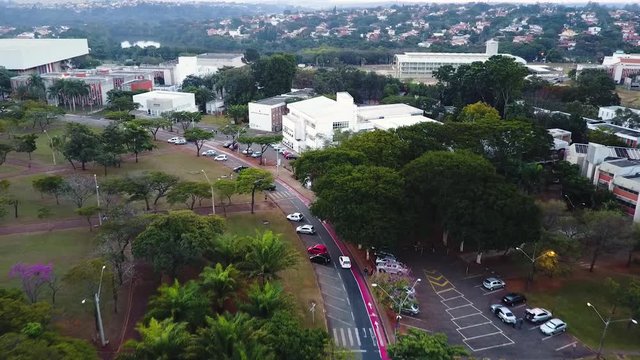 Drone shot following a car in city of Sao Paulo, Brazil