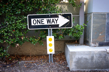 aged one way sign