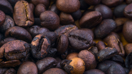 Coffee beans closeup with selective focus and crop fragment
