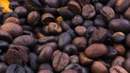 Coffee beans closeup with selective focus and crop fragment
