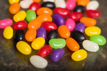 Assortment of Jelly Beans on a glass surface, colorful jelly beans.
