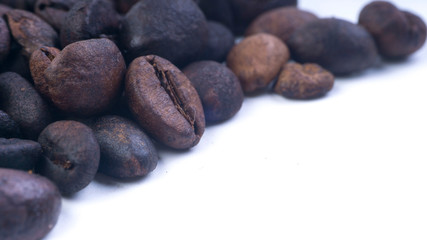 Coffee beans closeup with selective focus and crop fragment