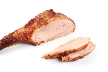 roast turkey leg and sliced turkey meat isolated on white background.