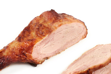 roast turkey leg and sliced turkey meat isolated on white background.