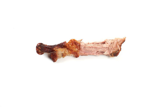 turkey bone after eating , isolated on a white background.