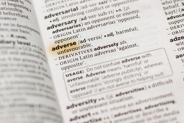 The word or phrase Adverse in a dictionary.