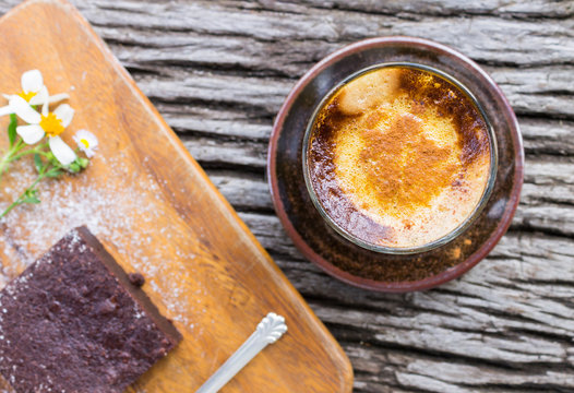 Latte Coffee and Chocolate Brownie Cake on Cutting Board on Wood Table Flatray