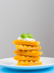 5 Pieces Heart Shape Waffle and Peppermint on Grey Background Portrait