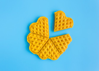 5 Pieces Heart Shape Waffle in Circle on Blue Pastel Background Minimalist Style