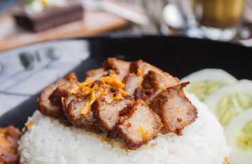 Thai Food Fried Pork with Garlic with Cucumber and Chocolate Brownie Cake and Latte Coffee