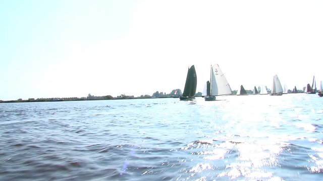 sailing with classic boats on inhore water Friesland The Netherlands