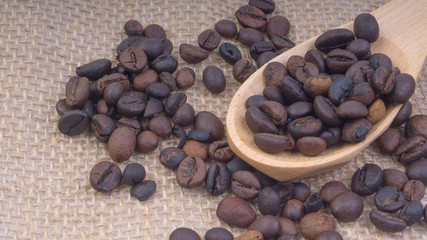 Coffee beans closeup with selective focus and crop fragment
