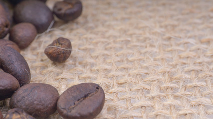 Coffee beans closeup with selective focus and crop fragment