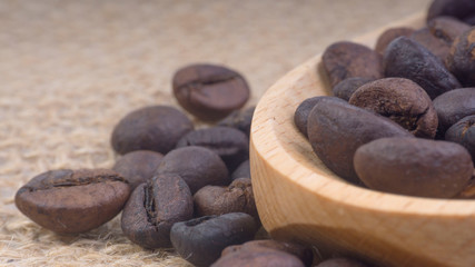 Coffee beans closeup with selective focus and crop fragment