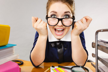 Happy business woman in office