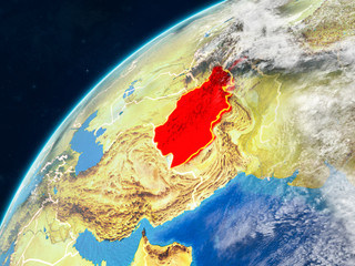 Afghanistan on realistic model of planet Earth with country borders and very detailed planet surface and clouds.