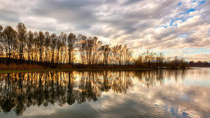 reflections on the lake at sunset