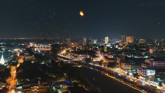 4K Timelapse of Floating lanterns and People in Yee Peng Festival or Loy Krathong celebration in Chiangmai, Thailand. (Right-Left)