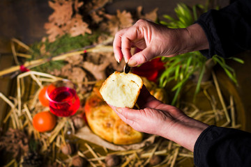 Finding coin in Orthodox Christmas eve bread - obrazy, fototapety, plakaty