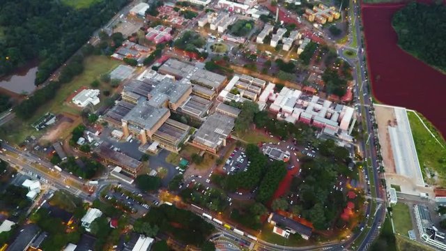 Slow reveal shot of cityscape of Sao Paulo, Brazil. Aerial view