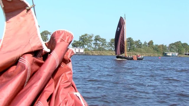 sailing with classic boats on inhore water Friesland The Netherlands