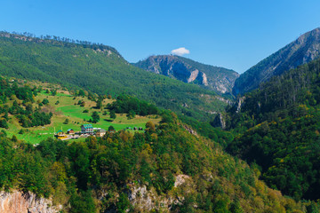 Fototapeta na wymiar Beautiful panorama of the summer mountain range in the national park Durmitor in Montenegro. September 2018