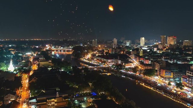 4K Timelapse of Floating lanterns and People in Yee Peng Festival or Loy Krathong celebration in Chiangmai, Thailand. (Zoom-Out)