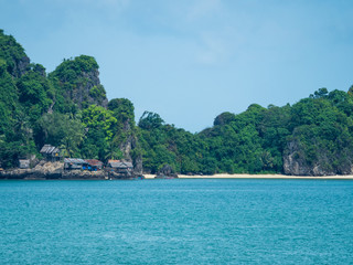 cliff , island , sea and blue sky
