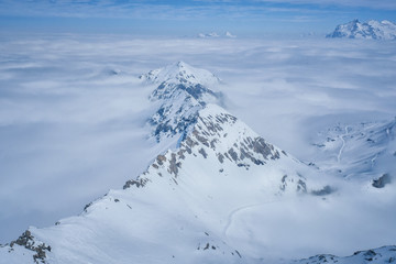 Fototapeta premium Stunning view of the snow mountain the Swiss Skyline from Schilthorn Piz Gloria, Switzerland