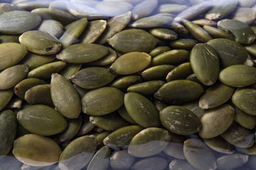 background texture of green pumpkin seeds