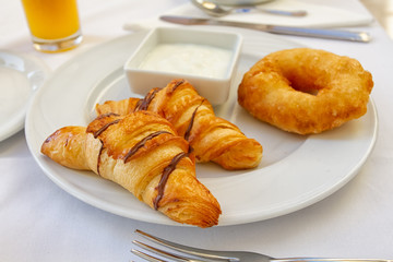 fresh croissant and coffee
