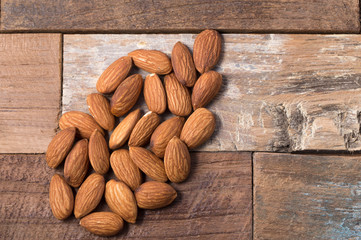 Almonds on a rustic wooden table