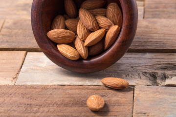 Almonds on a rustic wooden table